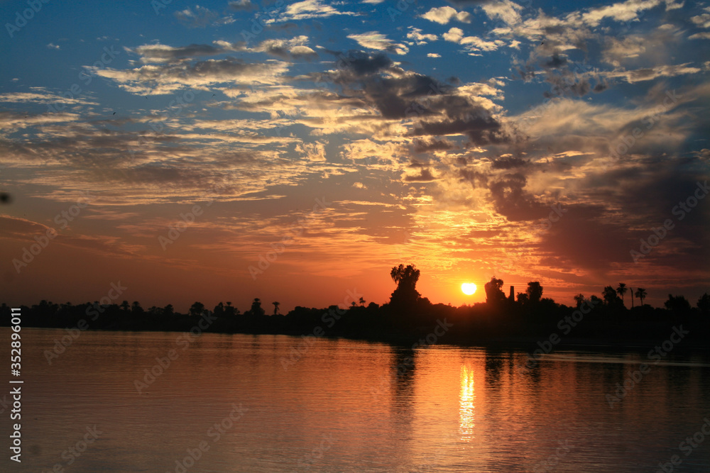 blue sky and sunset over a river