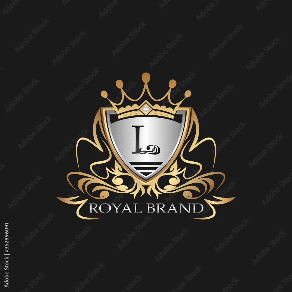 Fototapeta premium L Letter Gold Shield Logo. Elegant vector logo badge template with alphabet letter on shield frame ornate vector style design.