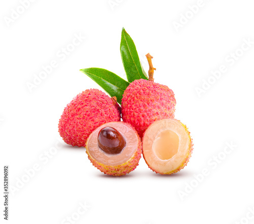 Fresh lychee with leaves on white background
