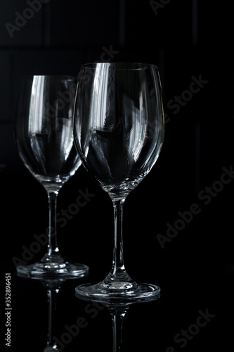 red wine glasses on a black background