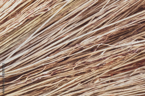 Straw sticks texture, brown dry rods. Abstract pattern, backgrounds. Striped surface.