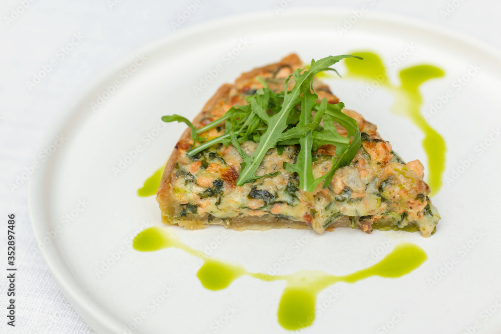 quiche an open pie with salmon. selective focus. quiche an open pie with salmon. selective focus.