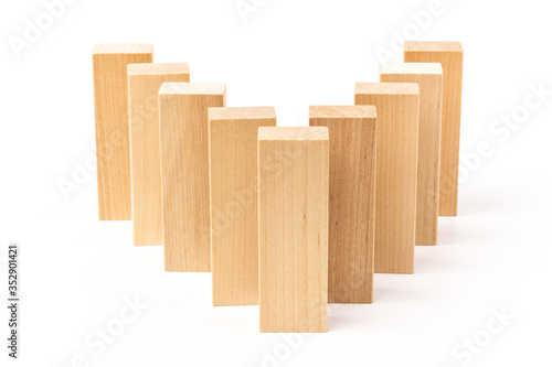 Domino effect  row of wood domino on white background