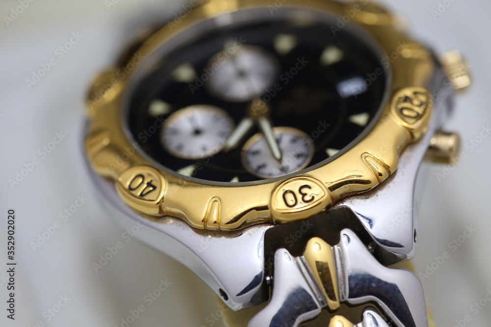 old gold swatch chronograph close-up