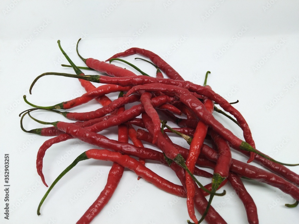curly chilies isolated on white background curly chilies isolated on white background