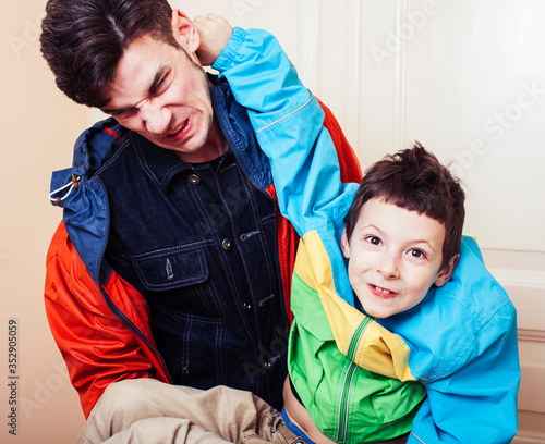 faher and son together having fun at home, lifestyle happy family, people at home photo