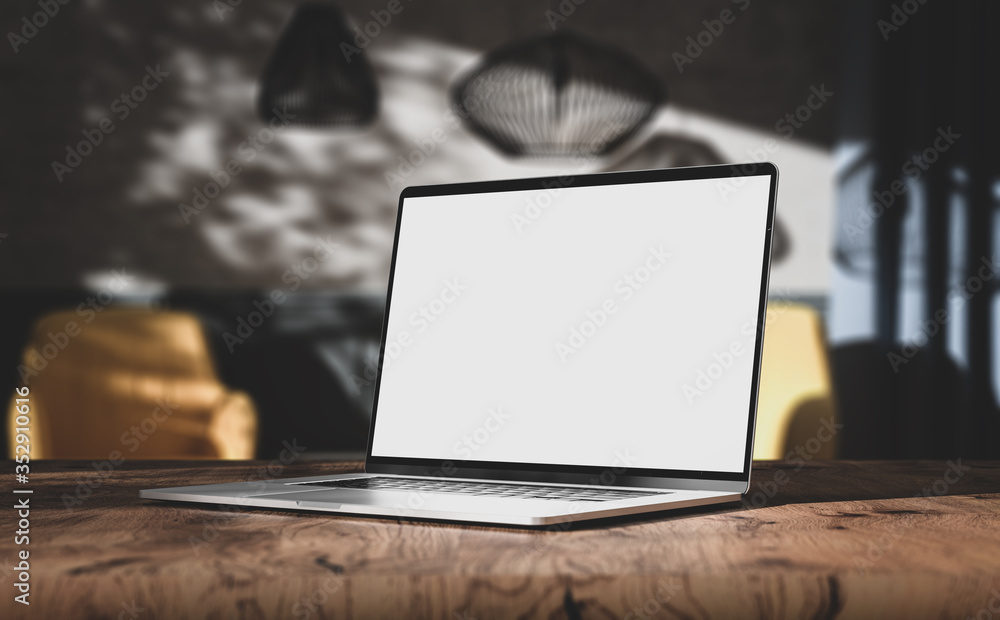 Laptop blank screen on wooden table in vintage living room interior ...