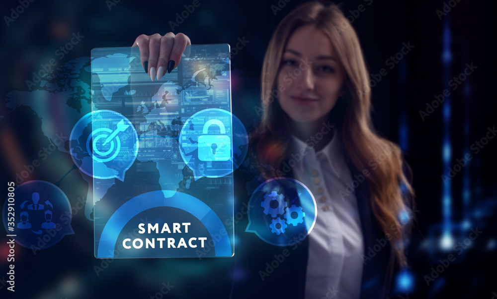 Business, Technology, Internet and network concept. Young businessman working on a virtual screen of the future and sees the inscription: Smart contract Business, Technology, Internet and network concept. Young businessman working on a virtual screen of the future and sees the inscription: Smart contract