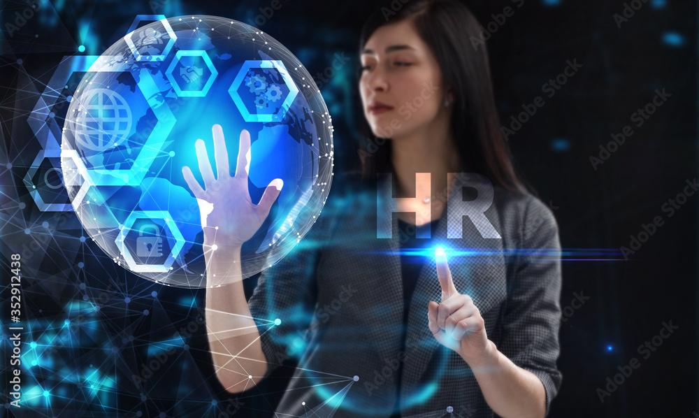 Business, Technology, Internet and network concept. Young businessman working on a virtual screen of the future and sees the inscription: HR Business, Technology, Internet and network concept. Young businessman working on a virtual screen of the future and sees the inscription: HR