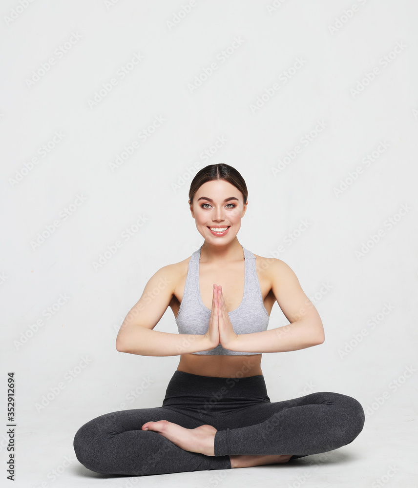 young woman working yoga exercise, over white background young woman working yoga exercise, over white background
