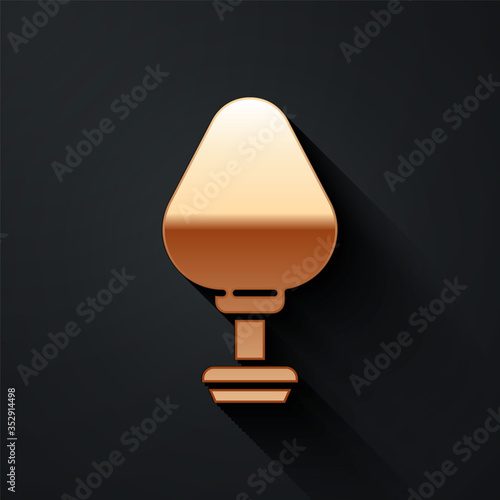 Gold Anal plug icon isolated on black background. Butt plug sign. Fetish accessory. Sex toy for men and woman. Long shadow style. Vector.
