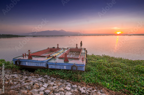 fishing boat at sunset