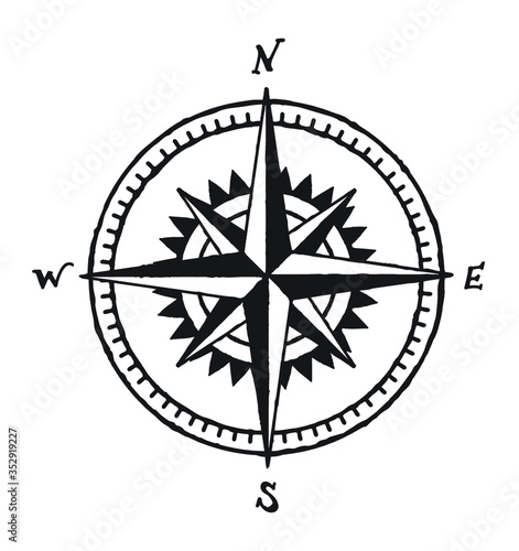 Vintage hand drawn wind rose vector in black and white. Nautical compass symbol tattoo drawing.