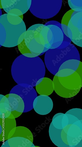 Multicolored translucent circles on a dark background. Green tones. 3D illustration