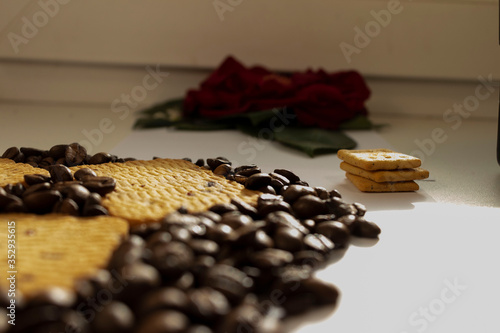 Breakfast coffee cookies morning still life background coffee grain on a white background candy flowers roses