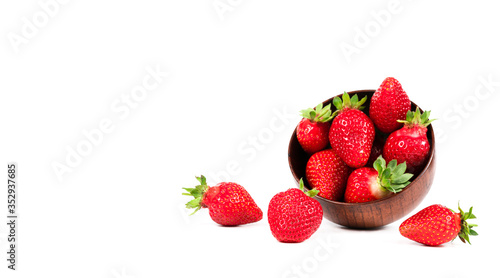 strawberries in a plate on a white background