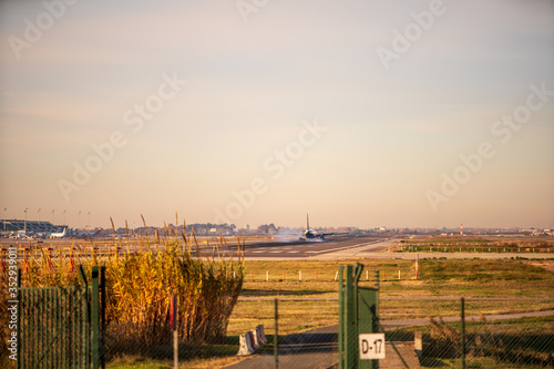 BARCELONA, CATALUNYA, SPAIN - DECEMBER 13, 2017: Ryanair company plane landing at El Prat airport, Barcelona.