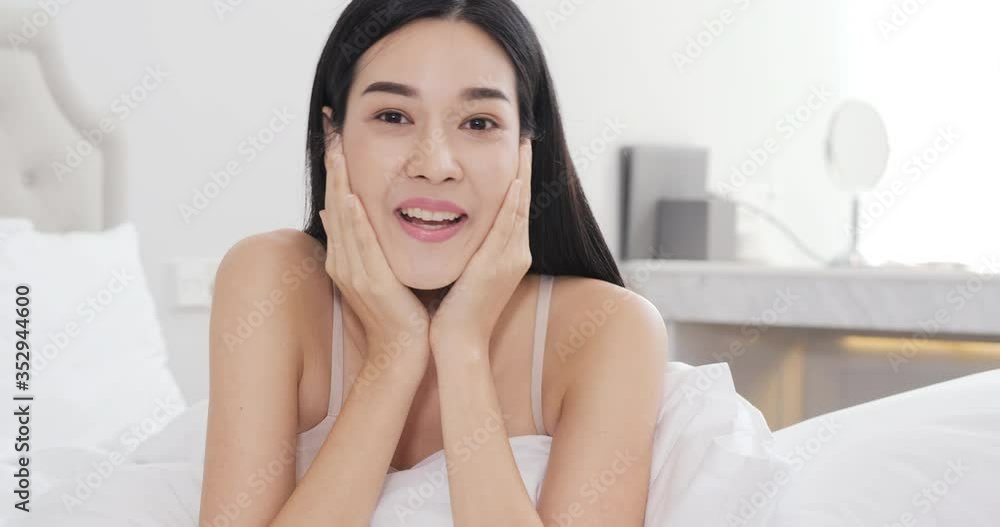 Beautiful woman using smartphone to talking with her friend at home. Stay at home, video conference, modern technology. Beautiful woman using smartphone to talking with her friend at home. Stay at home, video conference, modern technology.