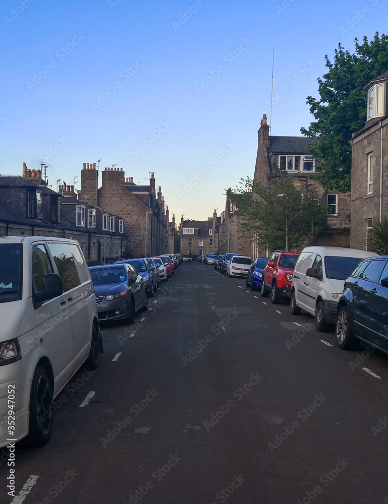 Aberdeen, Scotland/UK - May 21 2020: Empty streets during Coronavirus lockdown in Scotland with parked cars.