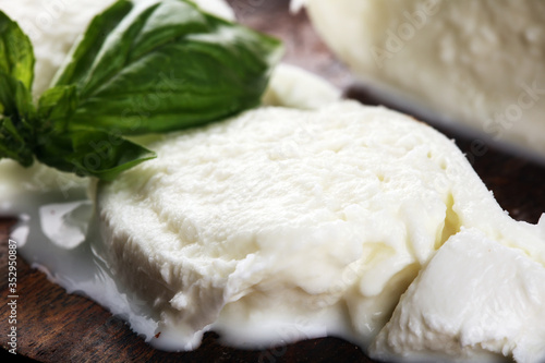 Mozzarella. Traditional italian food. White ball mozzarella buffalo Italian soft cheese with fresh basil