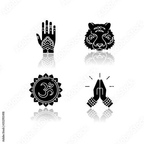 Indian culture drop shadow black glyph icons set. Mehndi on hand. Henna drawings. Bengal tiger. Om representation. Sound of universe. Namaste gesture. Isolated vector illustrations on white space