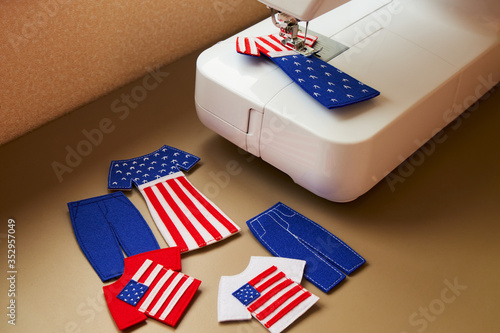 Felt toys in the sewing process. Presents with American flag. National clothes. Gifts for Independence Day.