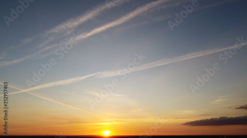  Sunset with contrails