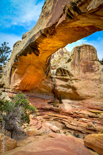 Stone arch under a trail walk in the Capitol reef National Park, Utah USA