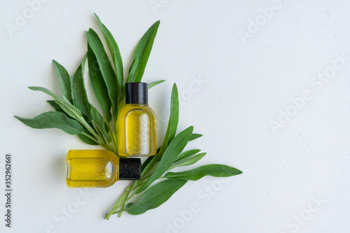 Essential oil with sage leaves extract. Hygiene bath product. Wellness therapy regeneration
