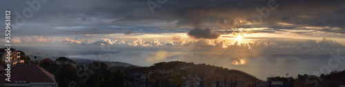 Panoramic view at dusk of lebanese shore with beirut in a far end photo