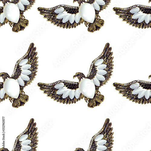 Metallic eagle isolated on white background. Seamless pattern. photo