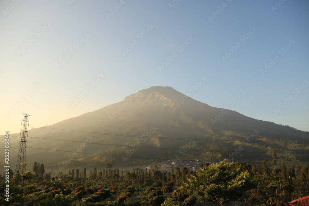 Fototapeta premium mountain sindoro landscape with fog
