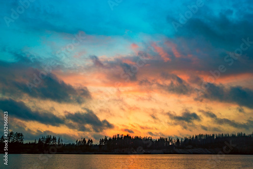 Sunset over the lake in spring. Vsevolozhsk. Leningrad region.