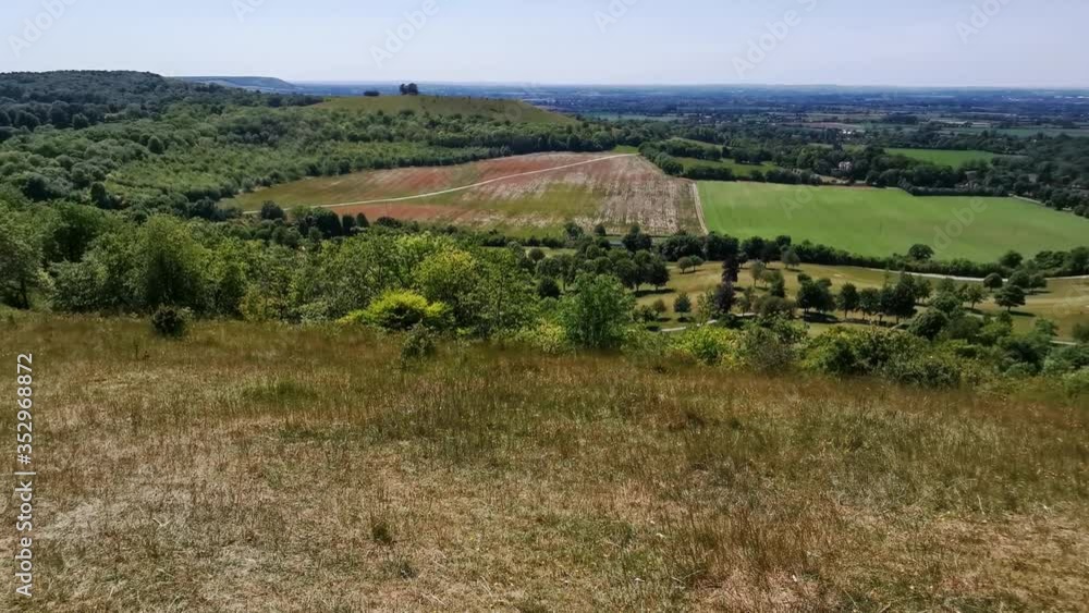 view from a hill in england and people talking nearby view from a hill in england and people talking nearby