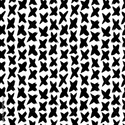 Black paint crosses vector seamless pattern. Decorative hand drawn letters X freehand illustration.