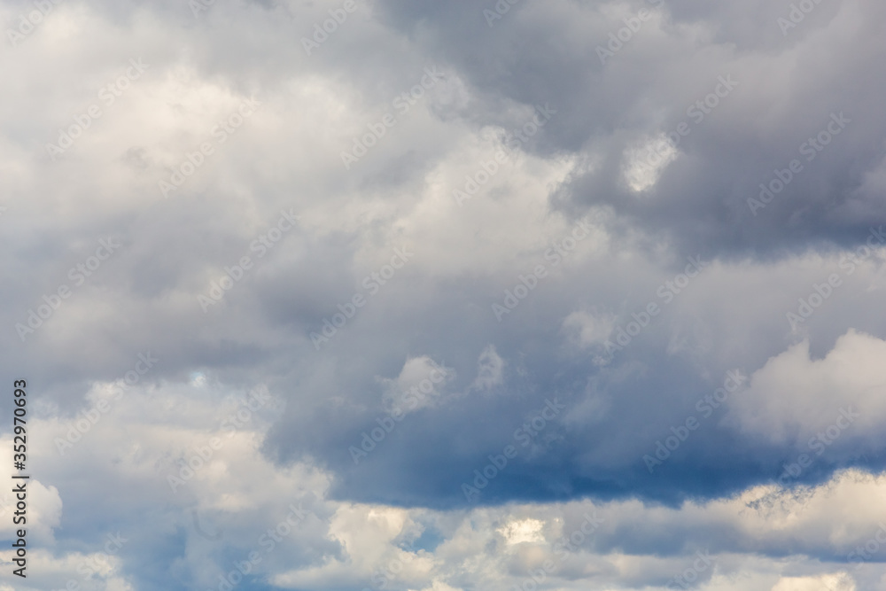 Obraz premium Thunderclouds on a gray sky. Beautiful background