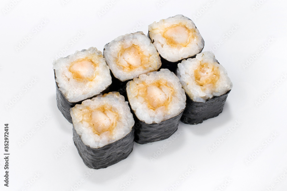 Japanese traditional roll with nori, rice, fried perch with teriyaki sauce on a white plate Japanese traditional roll with nori, rice, fried perch with teriyaki sauce on a white plate