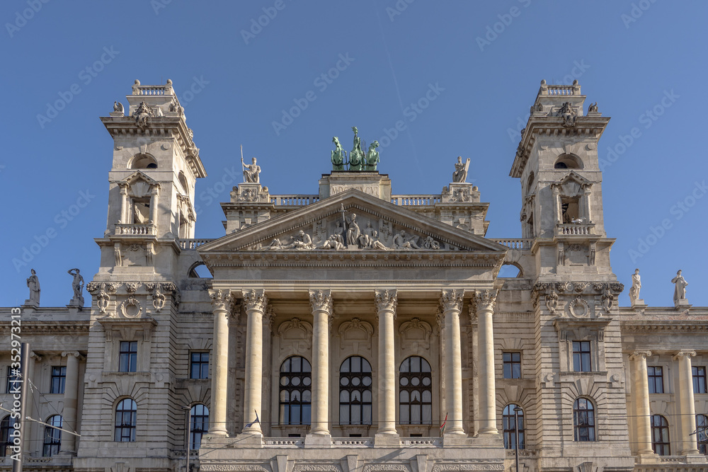 Neo Renaissance main facade with court trial sculptures on tympanum field of Museum of Ethnography in Budapest
