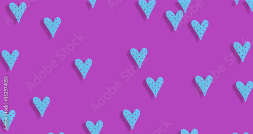 abstract Seamless cyan blue hearts shape on texture magenta background.