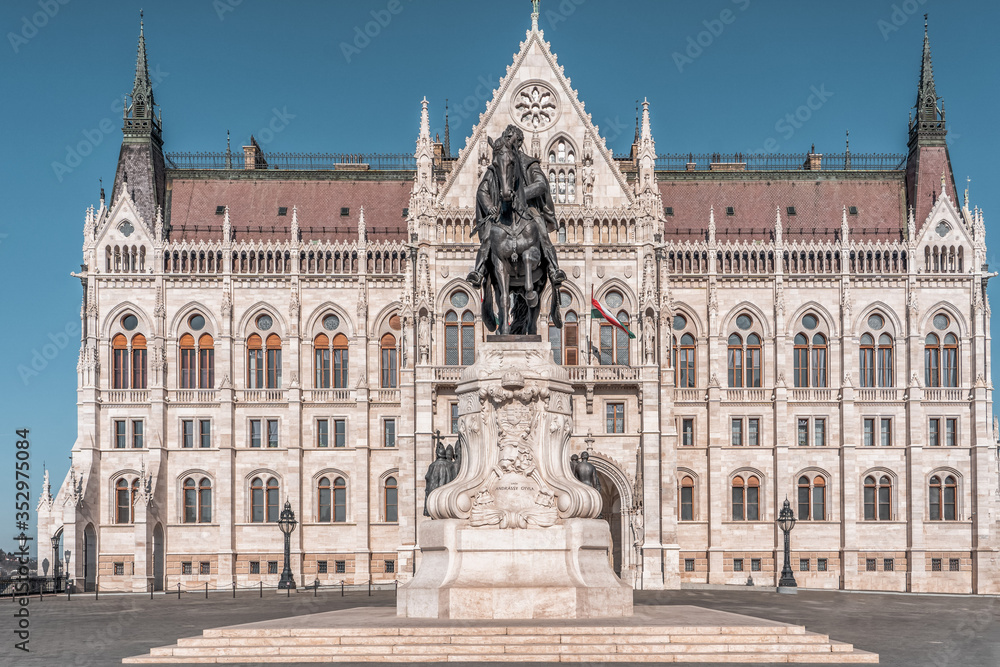 Bronze equestrian statue of Count Gyula Andrassy on lime stone in front of Hungarian Parliament south side in Budapest