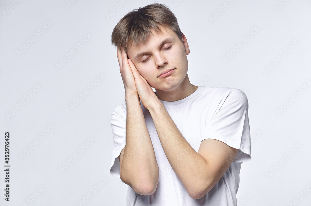 The young guy shows various emotions. Talented portrays the inner state and mood. Advertisement concept The young guy shows various emotions. Talented portrays the inner state and mood. Advertisement concept