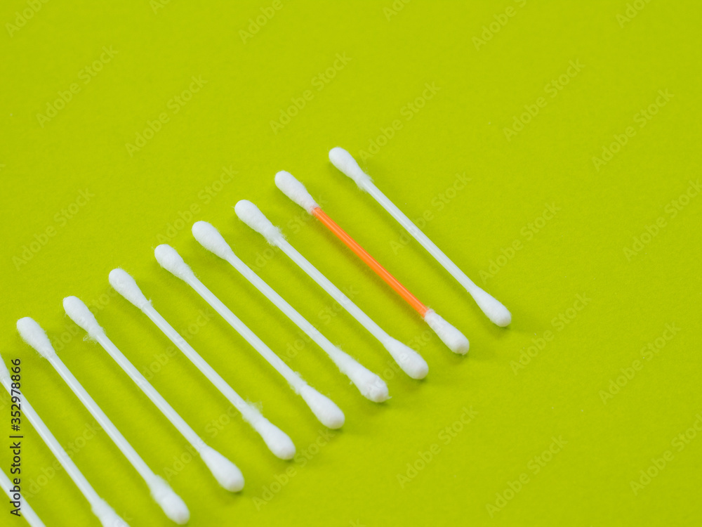 eared sticks lined up in sequence in green background eared sticks lined up in sequence in green background
