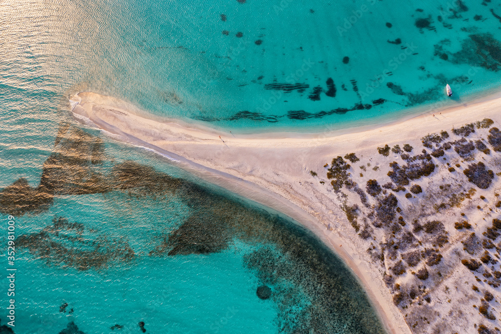 An aerial view of a desert island in the caribbean sea.
