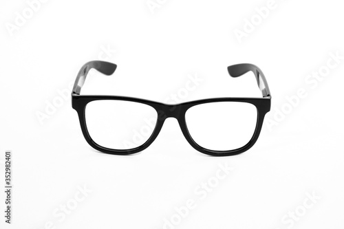 Black glasses with transparent glasses or eyeglass frame isolated on white background, banner or template