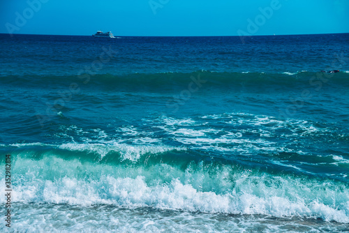 sea waves and blue sky in barcelona