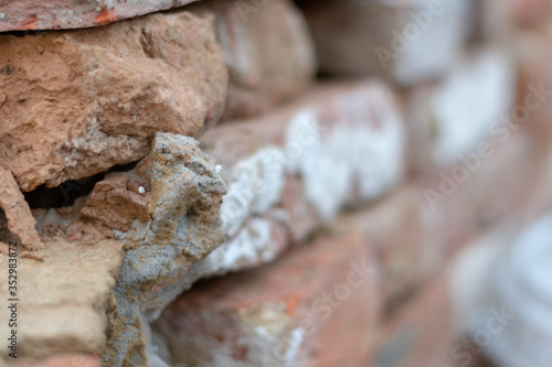 old brick wall with stone © Ingo