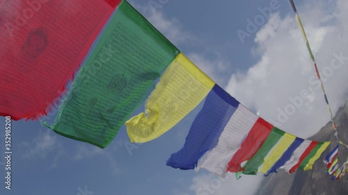 Prayer flags in Nepal, close up against the sky, Shot on RED Helium 8K 16Bit RAW, ProRES RED Gamma 2.2 photo