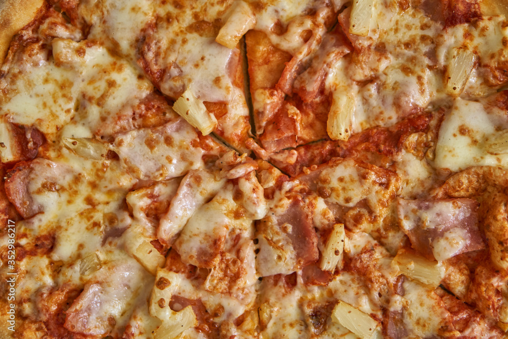 Pizza assorted pepperoni in a box and on a white plate. Fresh hot pizza with cheese and seafood. Pizza assorted pepperoni in a box and on a white plate. Fresh hot pizza with cheese and seafood.