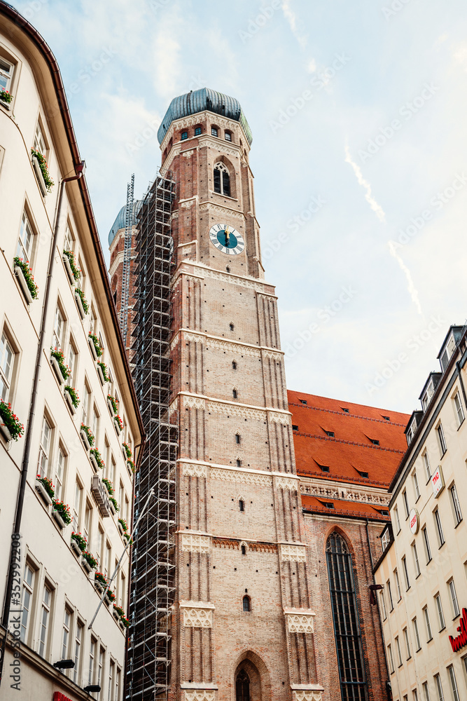 Munich, Germany - May 27, 2019: Hirmer department store in a traditional Bavarian building in downtown Munich