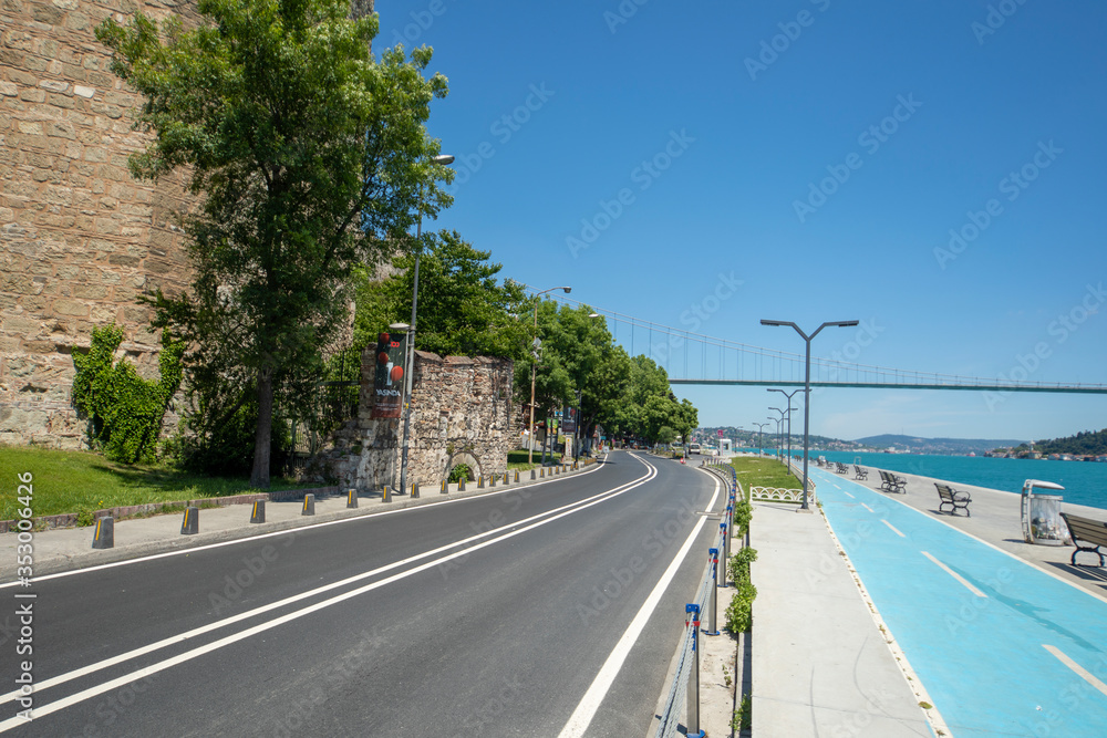Naklejka premium Emirgan road near Bosphorus and castle wall